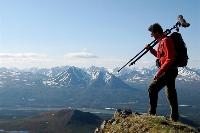 a person standing on top of a mountain