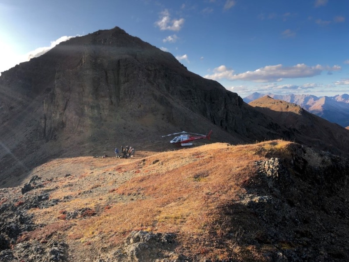 a canyon with a mountain in the background